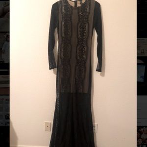 Long sleeve black lace maxi dress.